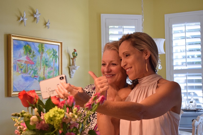 Robert E. Willis Elementary School fifth grade teachers say goodbye to other Willis teachers participating in a virtual flower arrangement class.