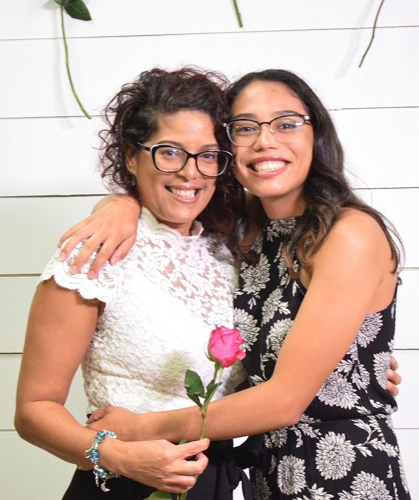 Sarasota's Miriam and Jessica Ortiz love getting dressed up for their Mother's Day portrait.