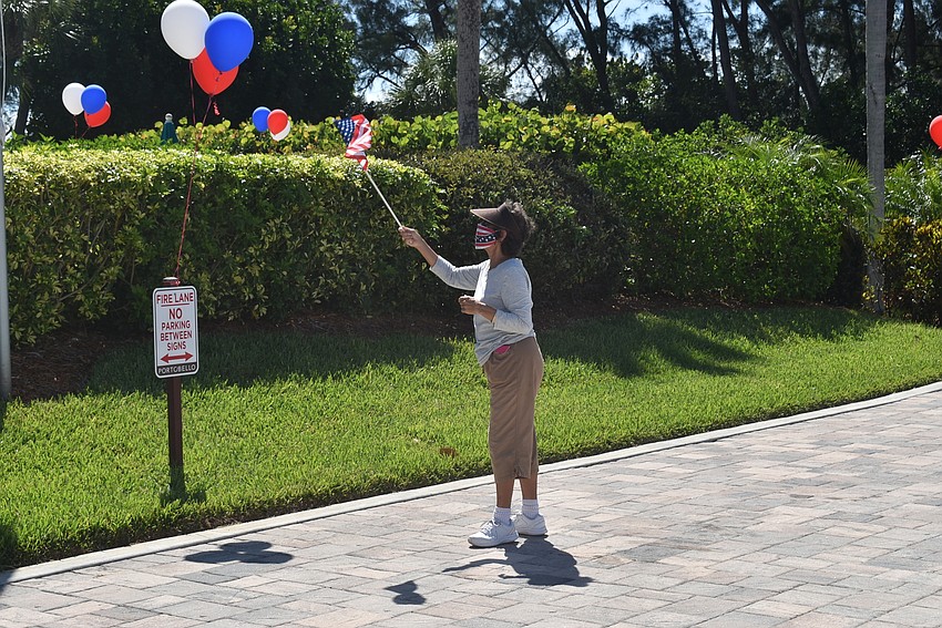 Louise Graham waves before conducting 