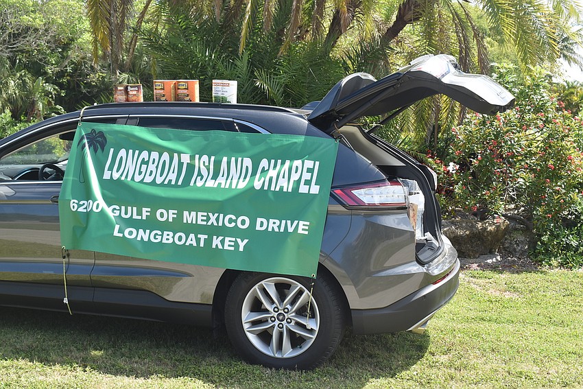 Two cars were being filled with donations.
