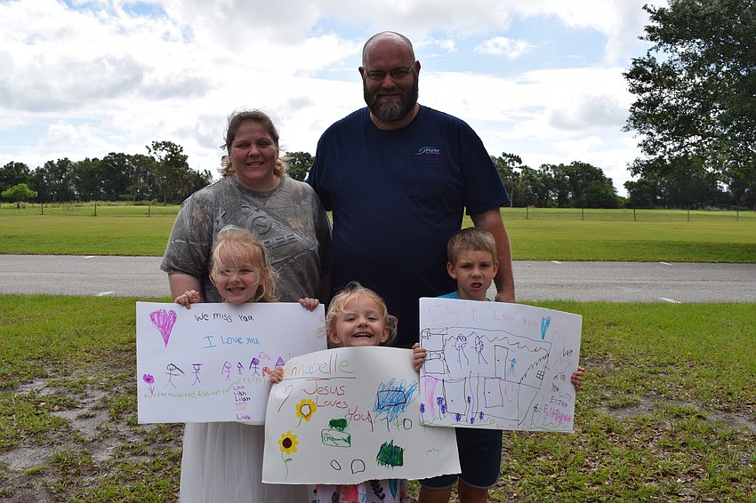 Danielle and James Peele enjoy participating in the parade with their children Lilah and Annabelle Peele and Elijah Johnson.