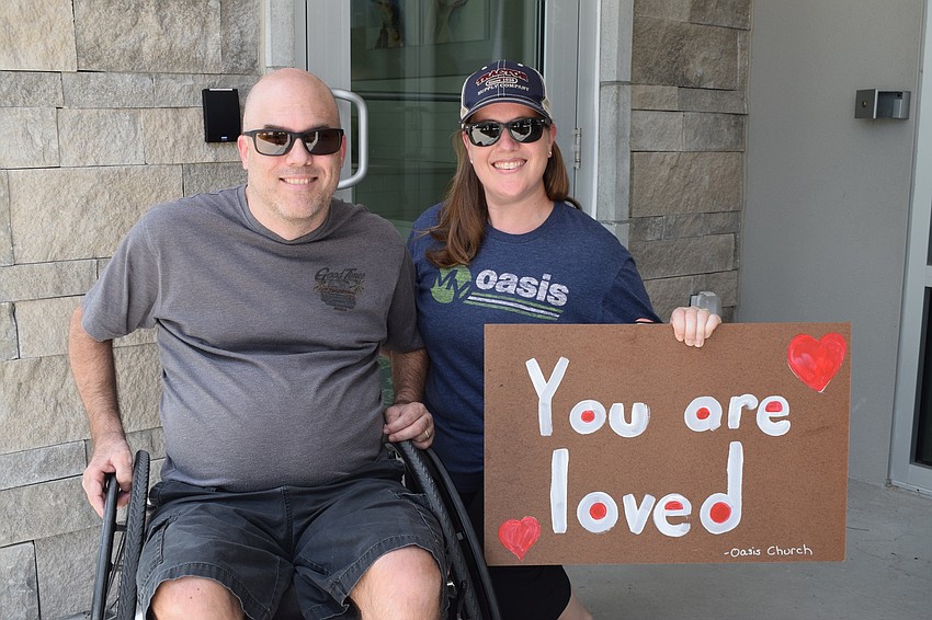 Jason and Laura Dugmore are excited to see some of their church family. Laura Dugmore says seeing them is uplifting, encouraging and a breath of fresh air.