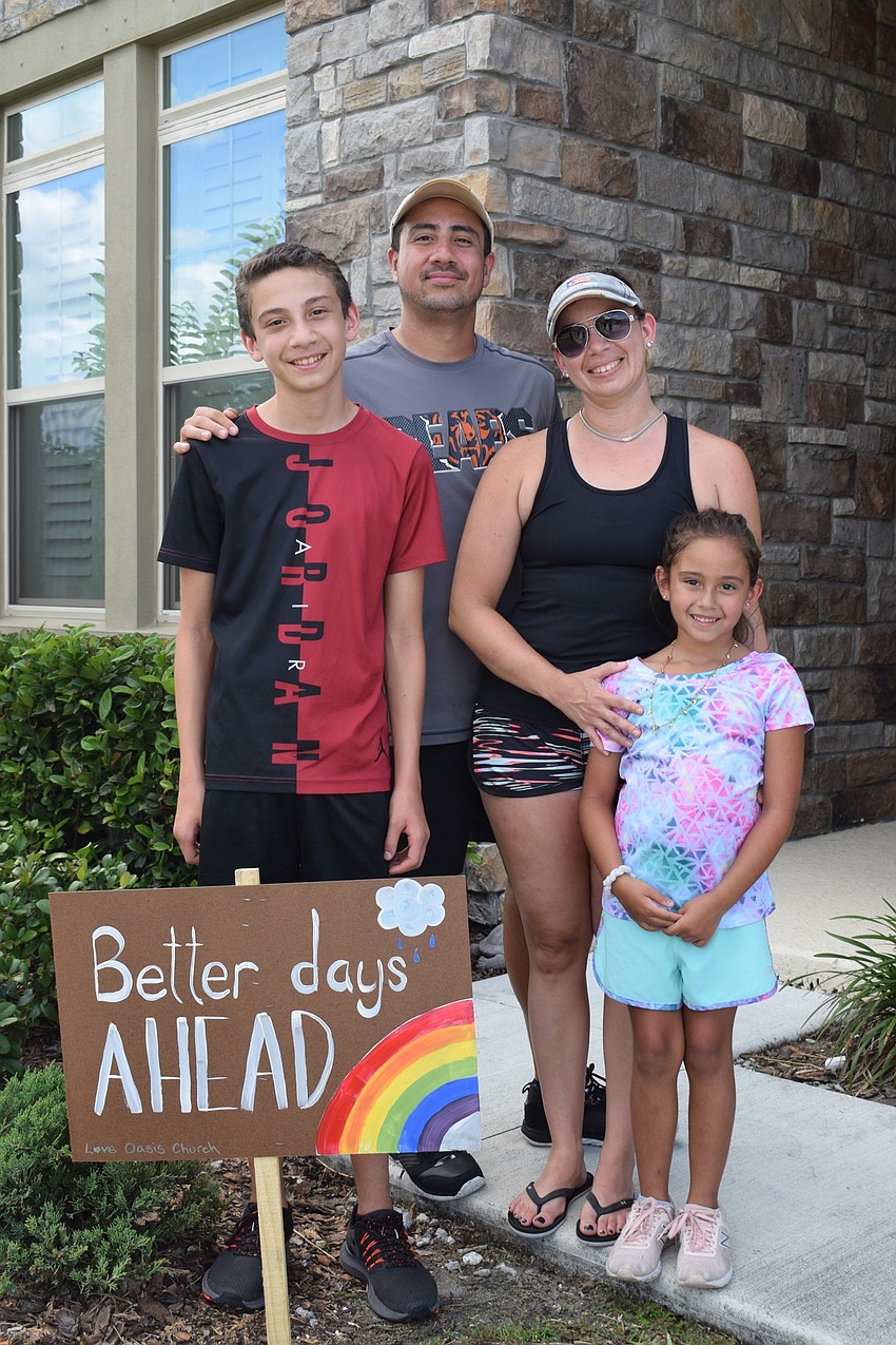 Jeremy, Josue, Jeany and Juliette Nunez enjoy being visited by Oasis Church members. 