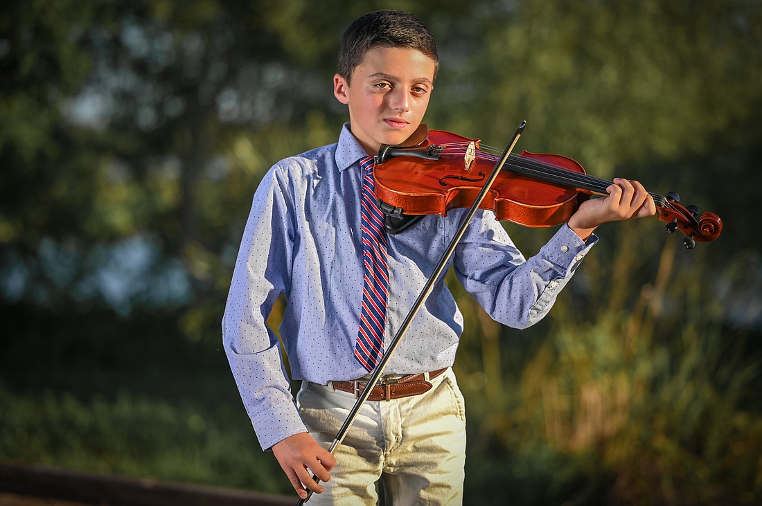 Brody Rose, a fifth grade student at Out-of-Door Academy, put together videos of his classmates performing and created a concert for Bay Village residents. Photo courtesy Neal Alfano