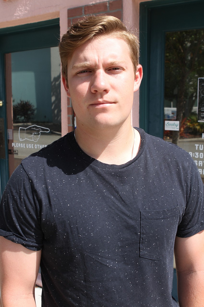 Cameron Lizotte has been waiting patiently for APX Barber Co. to reopen so he could get a cut.