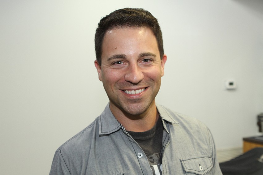 Michael Chenkus has been cutting his own hair during the shutdown but wanted a professional job done at Just Gents Barber & Spa.