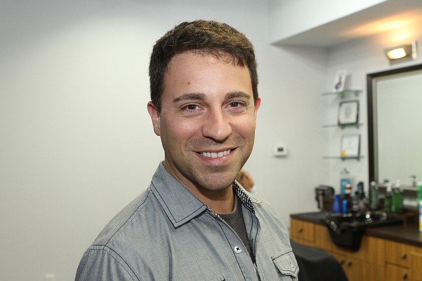 Michael Chenkus has been cutting his own hair during the shutdown but wanted a professional job done at Just Gents Barber & Spa.
