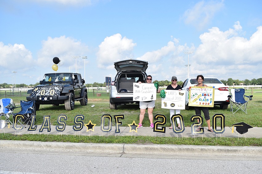 Michelle Collette, Lisa Stone and Fran Brandt say celebrating their seniors is bittersweet. Collette cried when her daughter Cassidy Ditsworth drove through the parade.