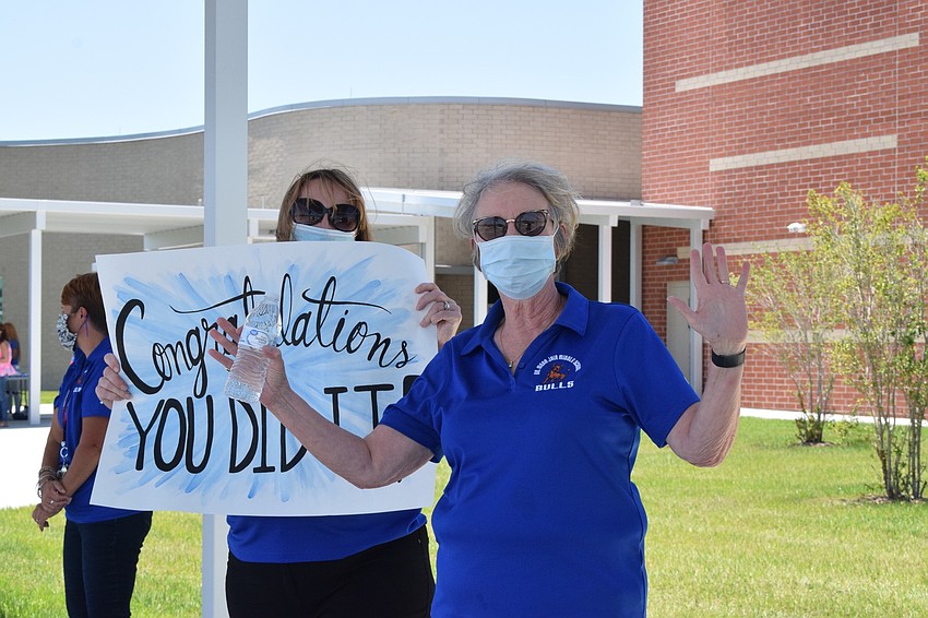 Rene Lewis, an eighth grade English teacher at Mona Jain, and Susan Toth, a school counselor, say it's bittersweet to see their eighth graders.