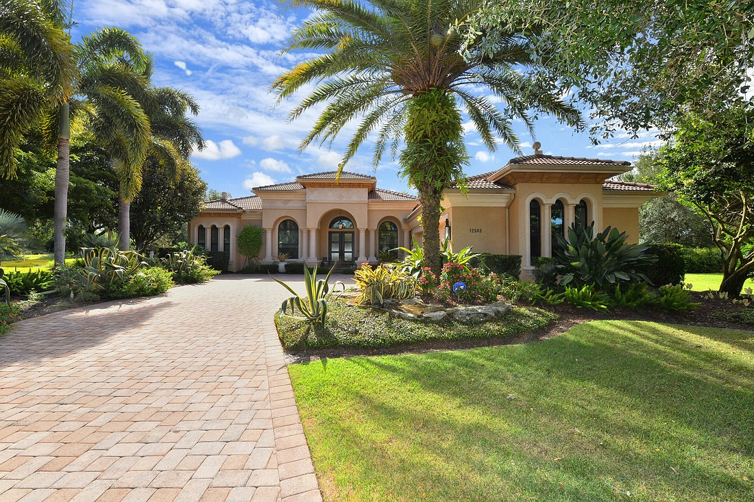 This Country Club at Lakewood Ranch home at 12539 Highfield Circle sold for $2.25 million. It has five bedrooms, five-and-a-half baths, a pool and 5,535 square feet. Photo courtesy of listing agents Jim and Donna So