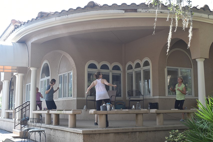 Brenner and her students on the Paradise Center porch.