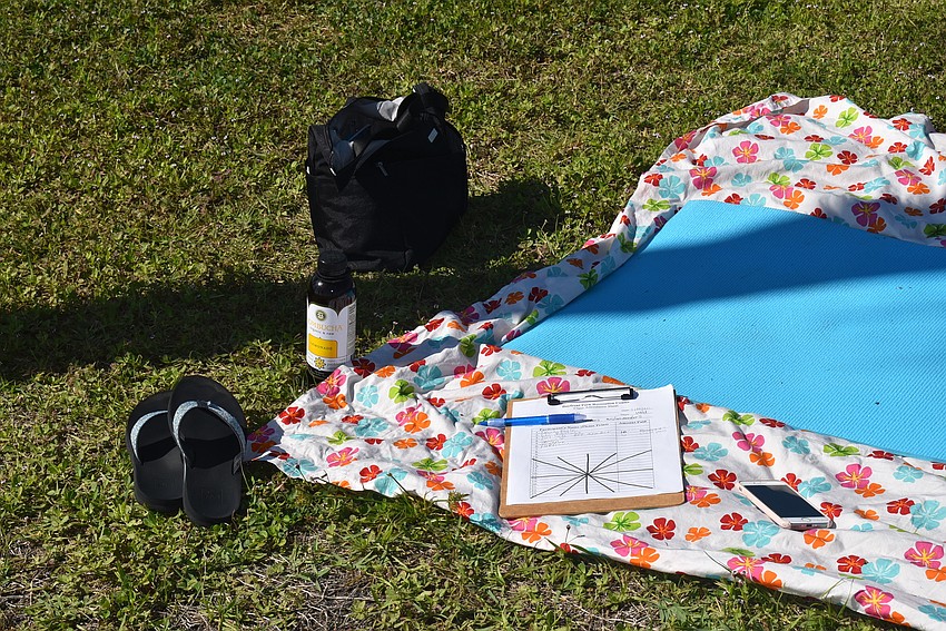 McClung set up her teaching materials in the grass.
