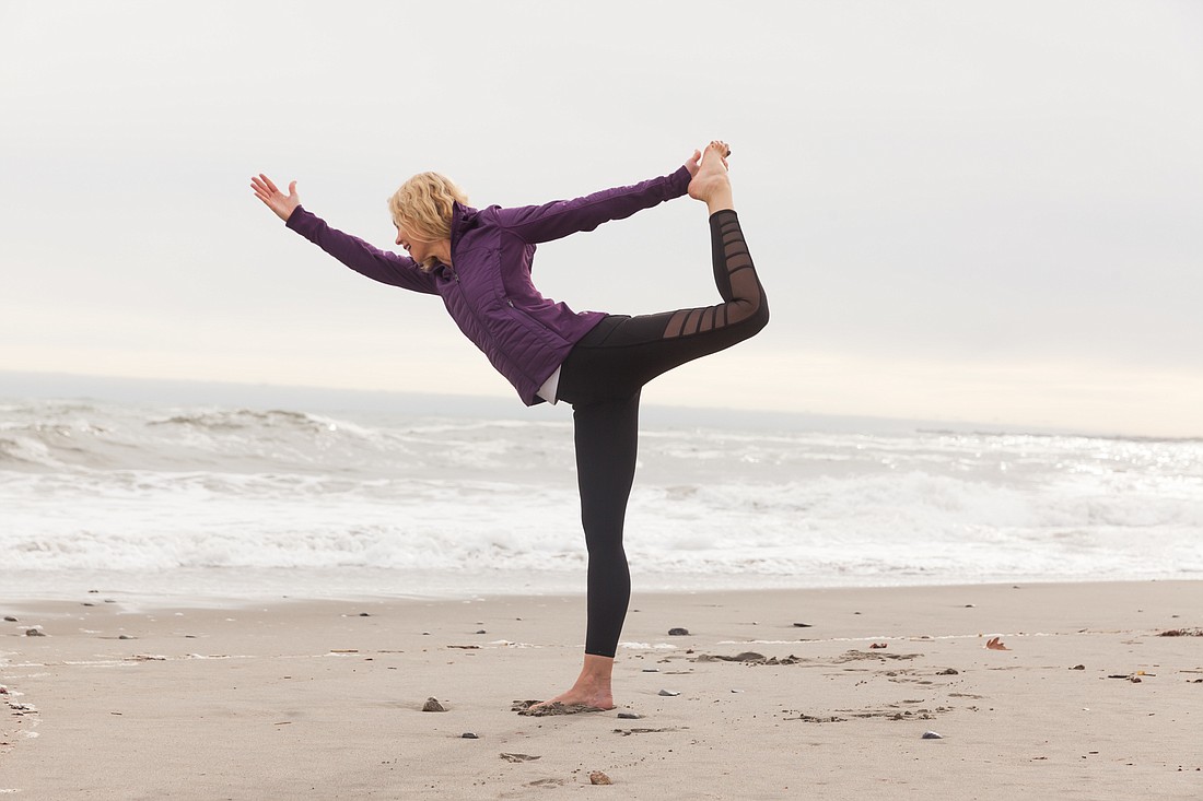 Stress management educator Trish Hart practices yoga as a form of self-care. She says nutrition, physical activity, sleep and social interaction are all critical components of self care. Courtesy photo.