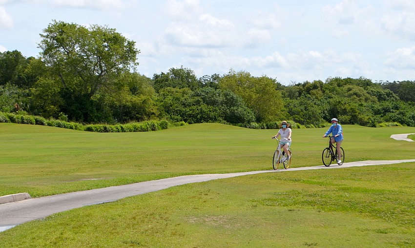 Cyclists enjoyed the American course's cart paths on Saturday.