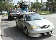 Dozens of cars circled the school.