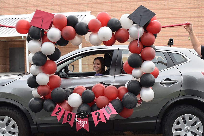 Gina Lovelace is the second senior to pick up her cap and gown. Lovelace is part of the top 10% of her graduating class.