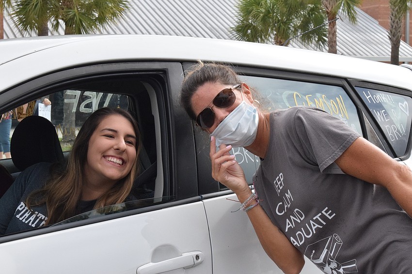 Senior Sophia Torlucci and business teacher Stefanie Minihan have enjoyed being in class together and working on the school store, Captain's Cargo.