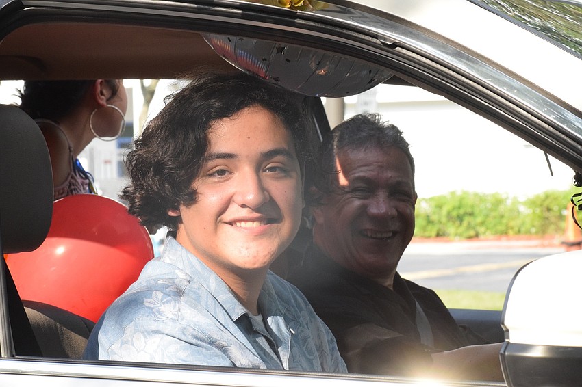 Gabriel Cortes, and eighth grader, enjoys seeing his teachers after months of being at home doing e-learning.