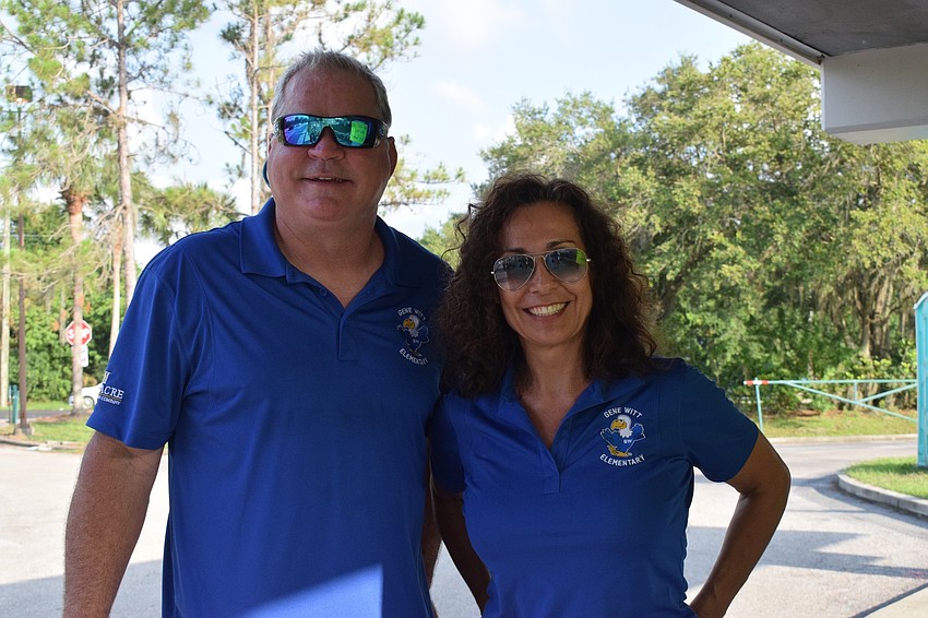 Gene Witt physical education teachers Bill Culbreath and Natasha Smith enjoy seeing the fifth graders for the last time.