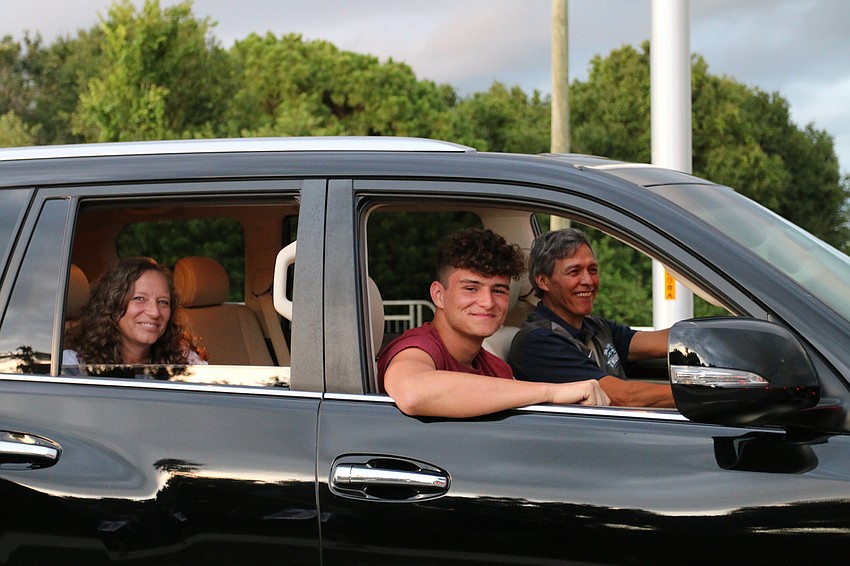 Senior Colin Castro and his family enjoy the festivities at Out-of-Door Academy. Courtesy photo.