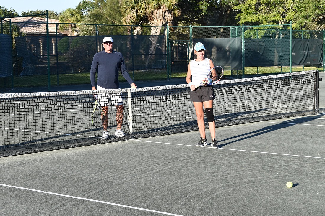 David Glorius and Kate Rhodes were the first two people to play when the Longboat Key Tennis Center reopened on May 8.