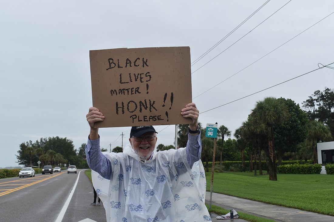 Anthony Measham keeps count of the honks the group gets, and on June 4 he had 40 in the time he was there.