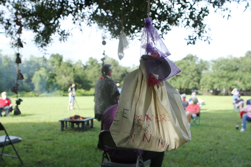 Church members hung prayer ties to the tree.