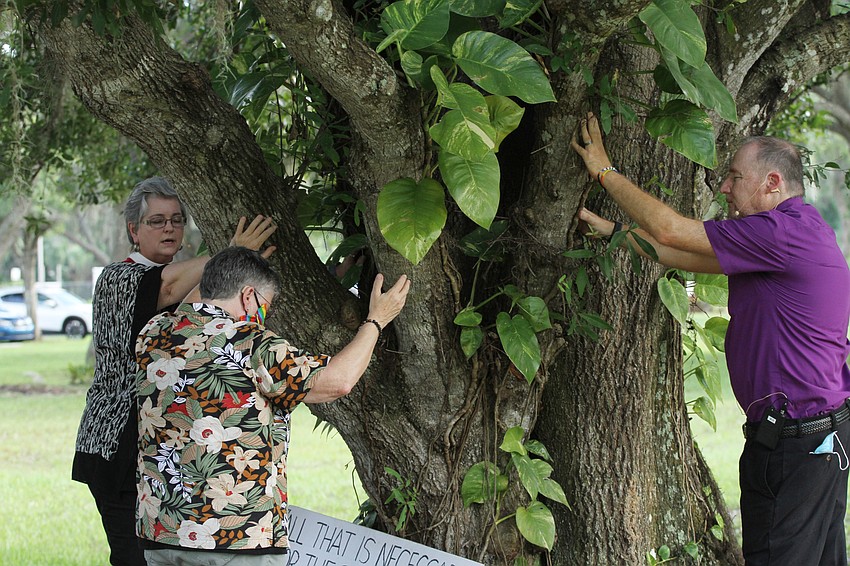 Reverend Elder Lillie Brock and other church members blessed the tree.