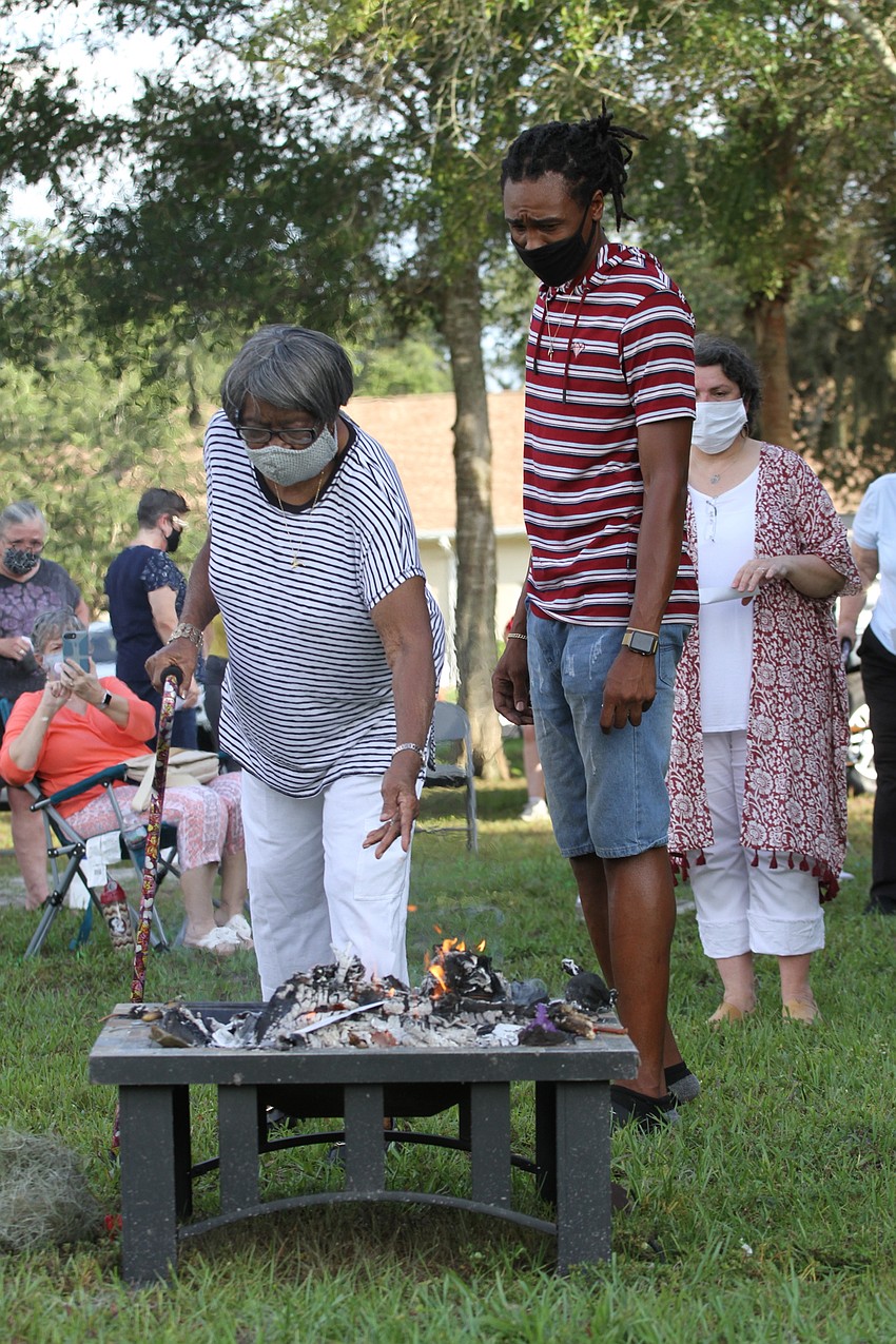 Ruthie Henderson and Derek Williams watched their prayers catch alight.