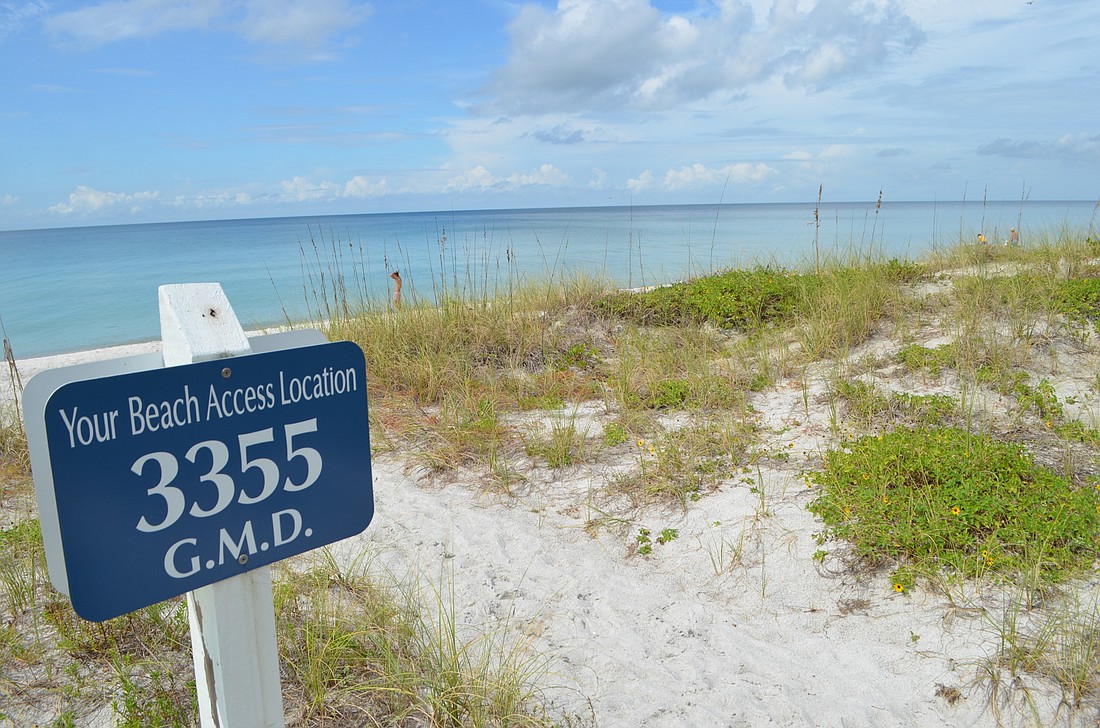 A look at one of Longboat Key&#39;s 12 public beach access points. Each of the access points has a four-digit code that corresponds to Gulf of Mexico Drive.