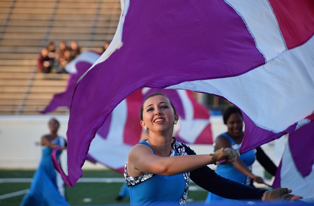 Braden River&#39;s Natalie Valentine smiles while performing at the state competition. Braden River&#39;s Marching Band of Pirates hopes to defend its state title, but it depends on whether school will reopen fully in the fall. File photo