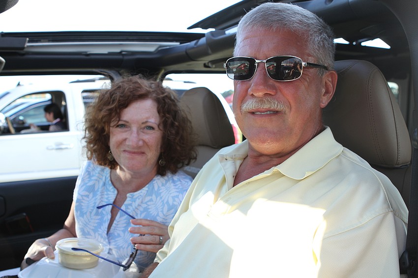 Colleen and Charlie Maguire watched the show from their car.