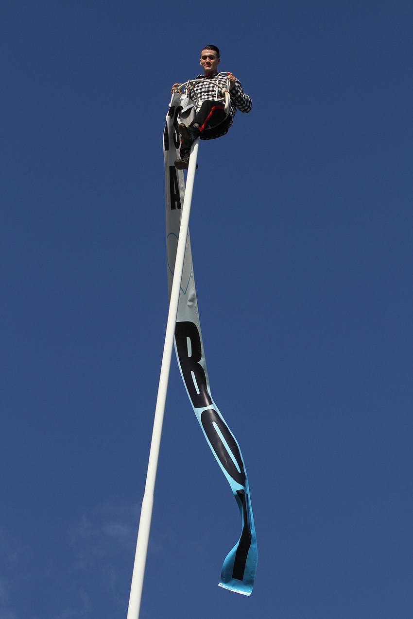 Alec Bryant pulled down the banner to reveal he'll be having a boy.