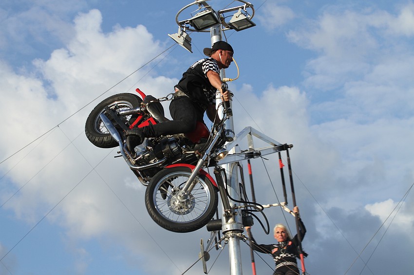 The Gravity Girl performance had two performers swinging and motorcycling high in the sky.