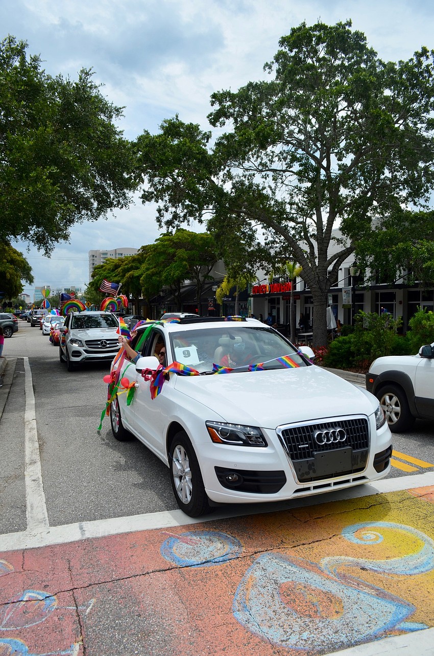 About two dozen cars took part.