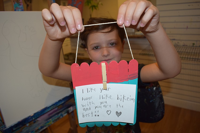 Lakewood Ranch 7-year-old Charlie Van Vliet let his dad, Mike Van Vliet, know how he feels.