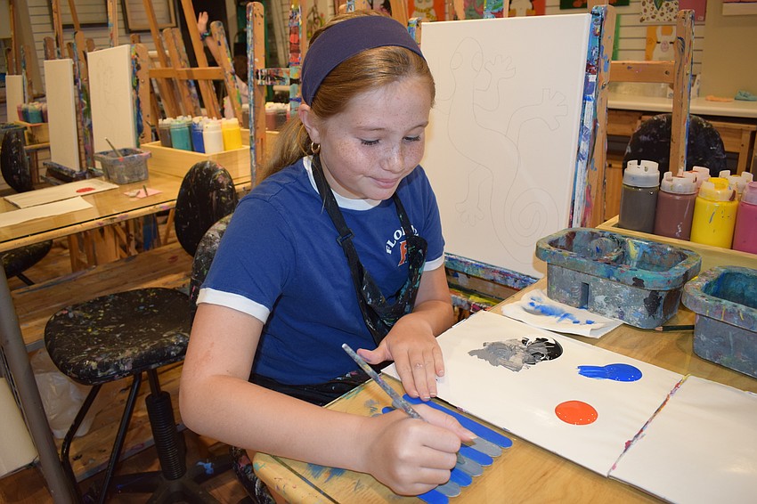 Lakewood Ranch 11-year-old Elise Kudelko paints for her dad, Dave Kudelko.
