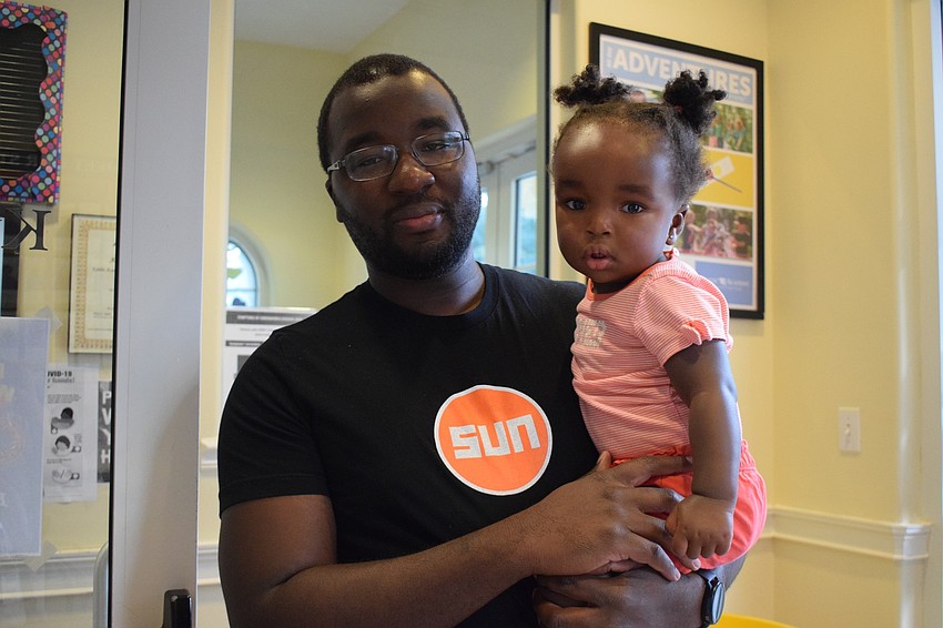 Ervin Scott celebrates Father's Day with his daughter Evelynn, who is 16 months old.