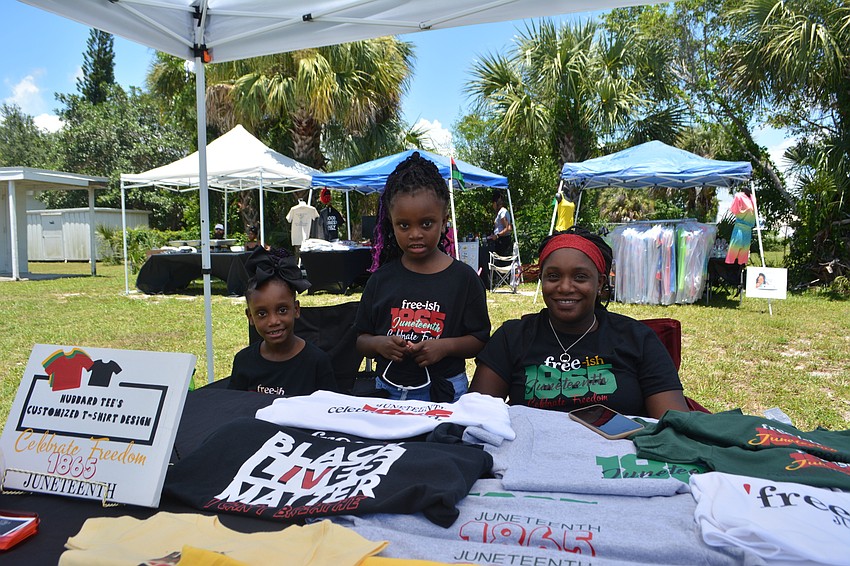Rilynn, Laylin and Whitney Hubbard of Hubbard Tees worked a tent offering T-shirts.
