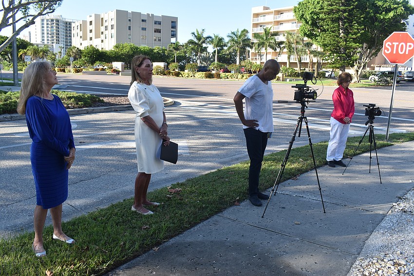 The rest of the retinue line up while Susan Phillips records her part.