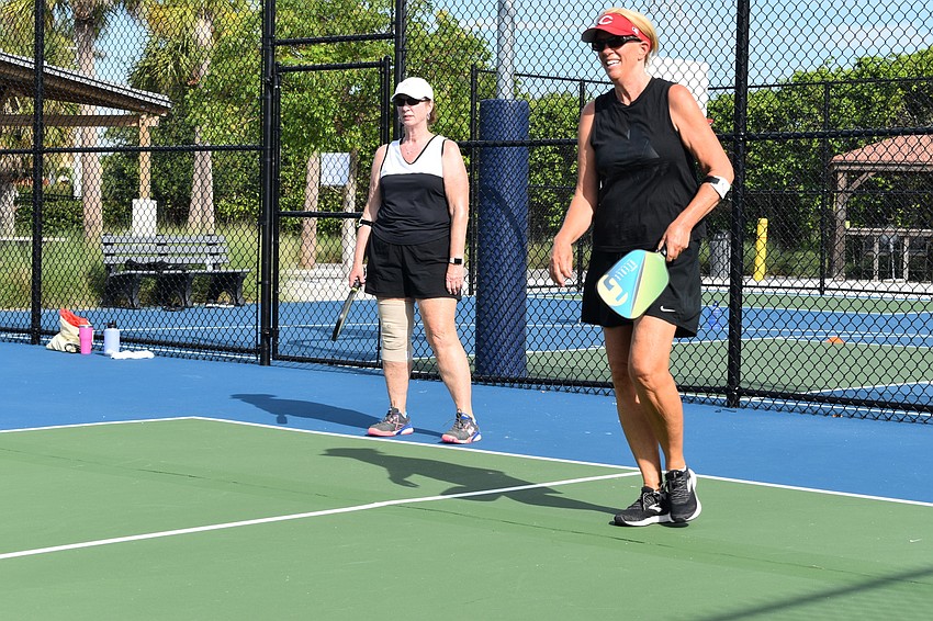 Peggy Theiss and Susan Burns prepare to receive a serve on Monday, June 22, 2020, at Bayfront Park in Longboat Key, Florida.