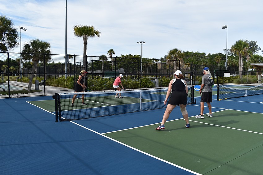 Sue Burns and Peggy Theiss played a doubles match against Bob Gordon and Nina Landgraf on Monday, June 22, 2020, at Bayfront Park in Longboat Key, Florida.