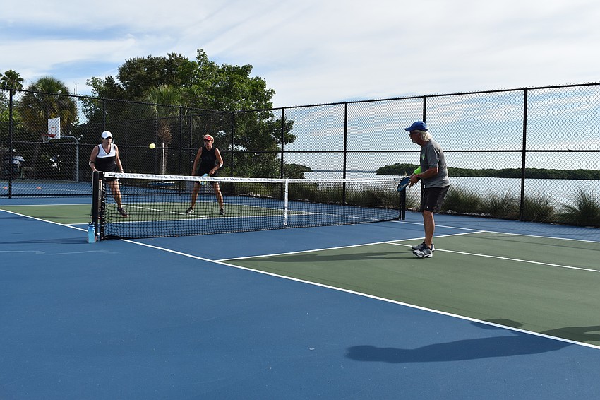 Peggy Theiss and Susan Burns await a serve on Monday, June 22, 2020, at Bayfront Park in Longboat Key, Florida.