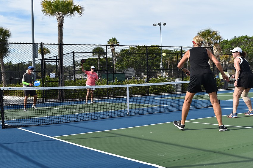 Sue Burns and Peggy Theiss played a doubles match against Bob Gordon and Nina Landgraf on Monday, June 22, 2020, at Bayfront Park in Longboat Key, Florida.