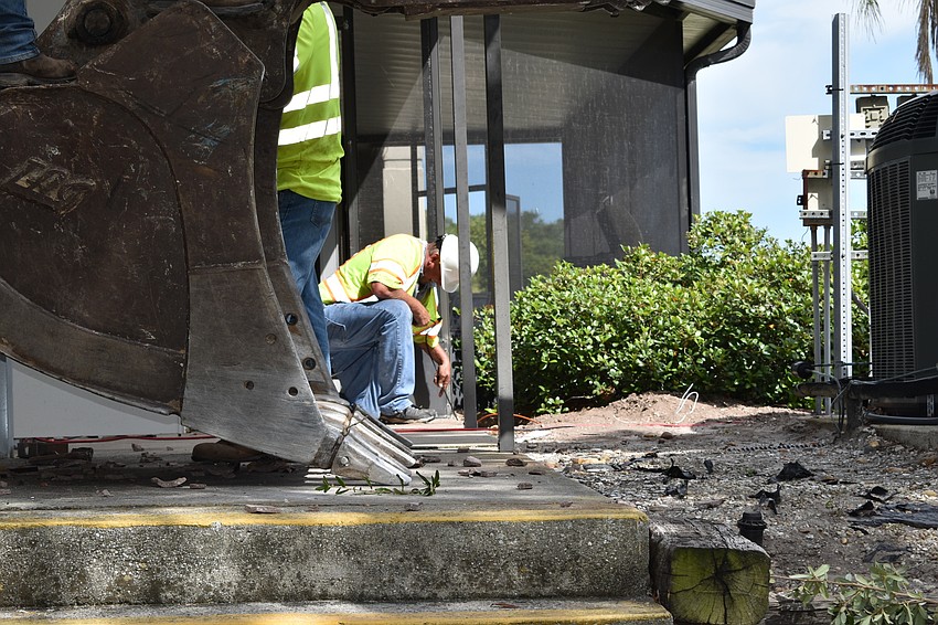 Crews worked to remove fiber lines on Monday, June 22, 2020 at the Longboat Key south fire station.