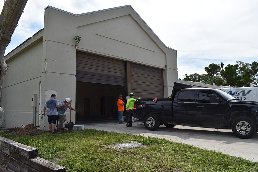 Crews work on Monday, June 22, 2020, to begin the demolition process at the Longboat Key south fire station.