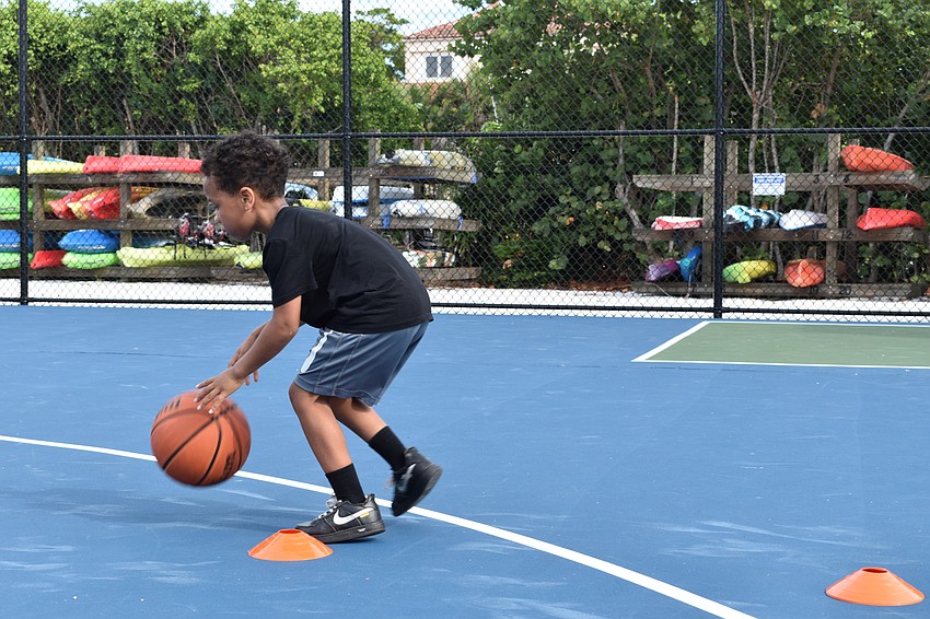 King Grant performs a dribbling drill on Monday, June 22, 2020, at Bayfront Park.