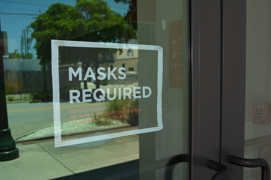 Although some businesses, including Artisan Cheese Company, are already requiring the use of masks, new city regulations could mandate face coverings in all indoor settings when social distancing is not possible.