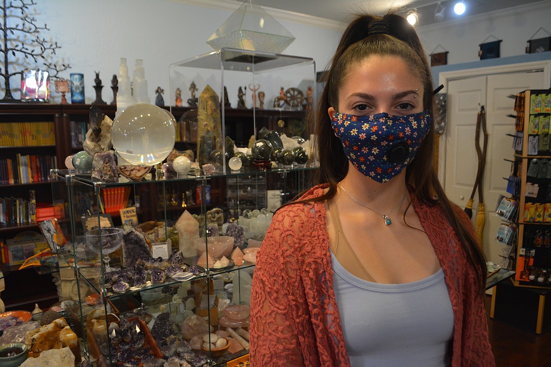 Miranda Prouty is an employee at Pixie Dust, a downtown store that requires masks for entry. Pixie Dust workers said they saw the masks as a step that helped ensure the safety of their customers.