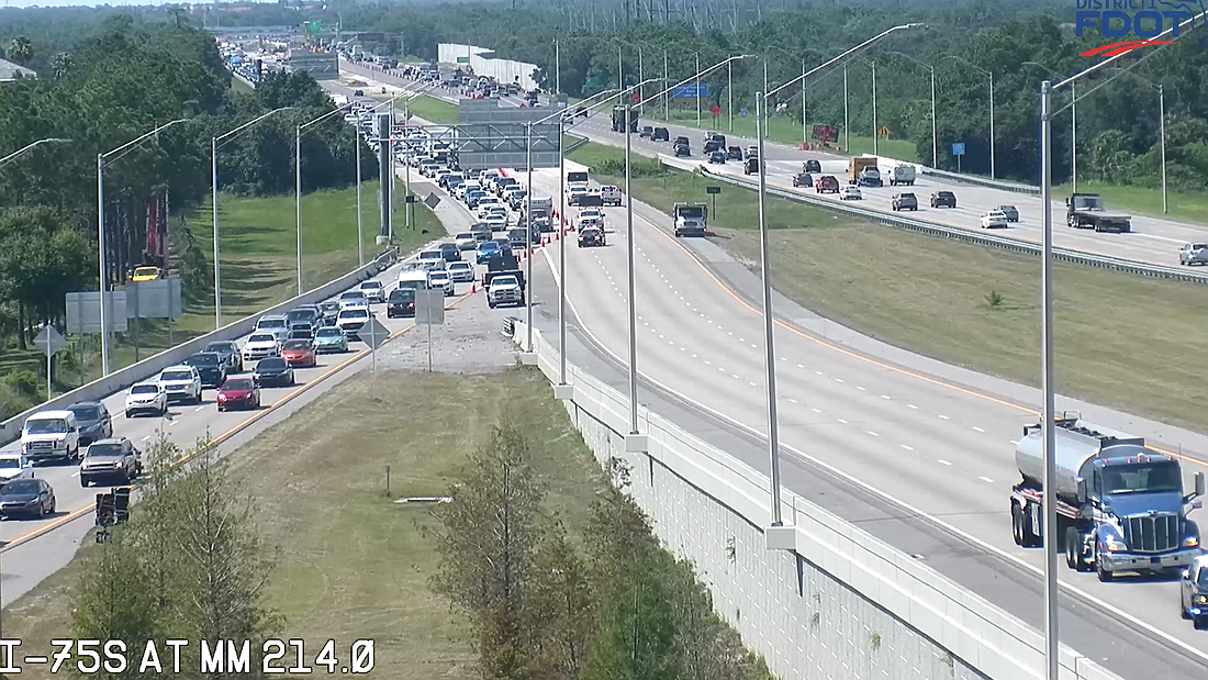 Traffic exits Interstate 75 southbound at University Parkway, because of a crash on the overpass in this FDOT traffic camera image.
